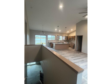 New construction. 4 Br/3BA lakefront home with open floor plan - photo 2