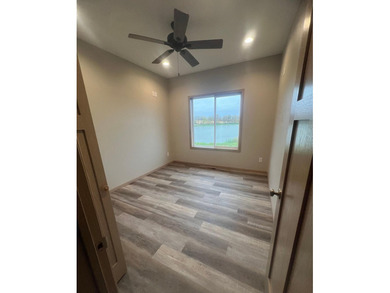 New construction. 4 Br/3BA lakefront home with open floor plan - photo 4