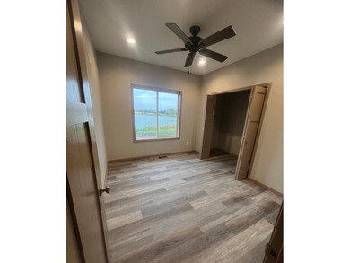 New construction. 4 Br/3BA lakefront home with open floor plan - photo 5