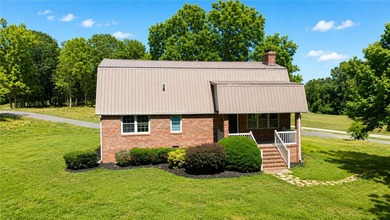 Character. Acreage. Lake recreation. Welcome to 56 Brickle Lane - photo 1
