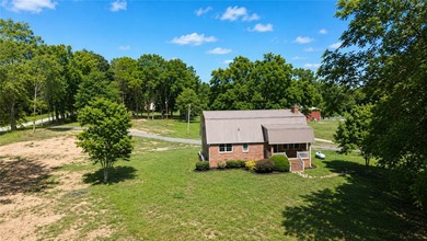 Character. Acreage. Lake recreation. Welcome to 56 Brickle Lane - photo 2