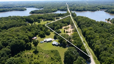 Character. Acreage. Lake recreation. Welcome to 56 Brickle Lane - photo 3