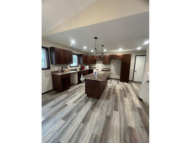 Enjoy peaceful lakeside living in this stunning NEW CONSTRUCTION - photo 4