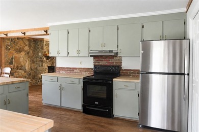 Character. Acreage. Lake recreation. Welcome to 56 Brickle Lane - photo 6
