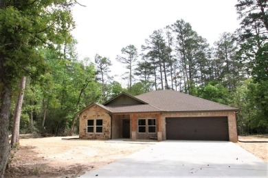 Beautiful, brick home, almost 2100 sq. feet under roof and - Lake Home For Sale in Holly Lake Ranch, Texas