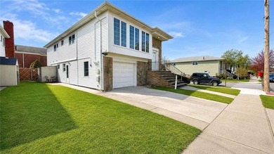 A charming two-family corner home nestled in the desirable Manor - photo 2