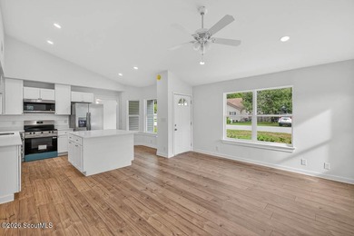 LIKE NEW and completely renovated from top to bottom, this - photo 14