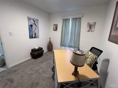 COME AND SEE this centrally located condominium in the bustling - photo 14