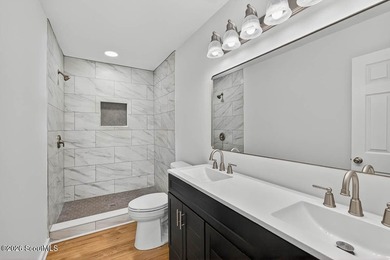 LIKE NEW and completely renovated from top to bottom, this - photo 19