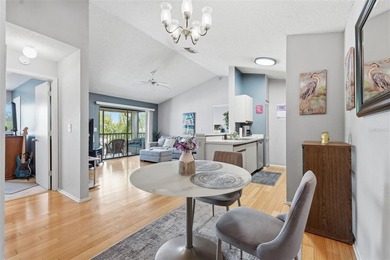 This bright and inviting 3rd-floor corner condo in coveted - photo 4