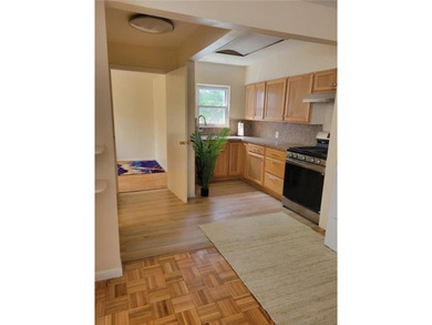 Location, Location, Location!! 2 family home with 5 bedrooms & 2 - photo 6
