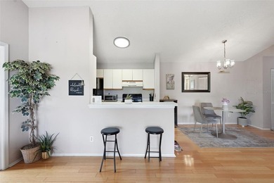 This bright and inviting 3rd-floor corner condo in coveted - photo 6