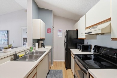 This bright and inviting 3rd-floor corner condo in coveted - photo 7