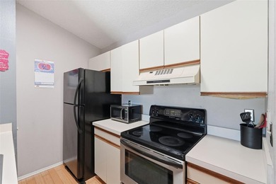 This bright and inviting 3rd-floor corner condo in coveted - photo 8