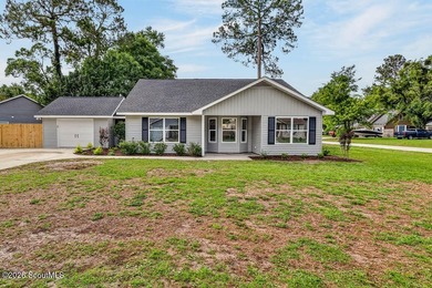 LIKE NEW and completely renovated from top to bottom, this - photo 32