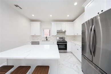 Welcome to this newly built (2023) fully detached 2-family home - photo 8