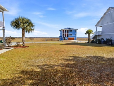 Panoramic views of Winyah Bay await you in this gorgeous *to be - photo 9