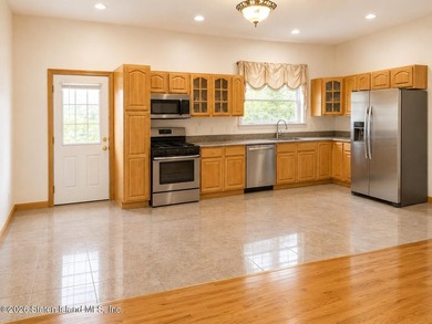 Opportunity to own legal 2 family with full finished basement - photo 3
