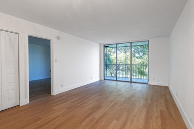 Fully renovated 2-bedroom, 2-bath condo located in the gated - photo 2