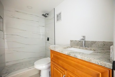 Fully renovated 2-bedroom, 2-bath condo located in the gated - photo 4