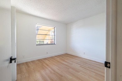 Fully renovated 2-bedroom, 2-bath condo located in the gated - photo 7