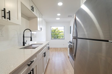 Fully renovated 2-bedroom, 2-bath condo located in the gated - photo 9