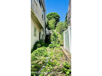 An opportunity to own a vintage street-to-street property on a - photo 9