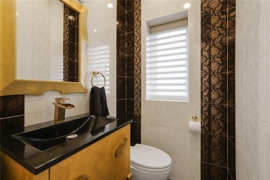Welcome to 2117 East 73rd Street, a one-of-a-kind Center Hall - photo 9