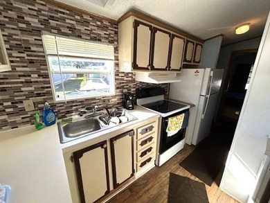 This cozy, fully furnished 1-bedroom, 1-bathroom home is the - photo 6