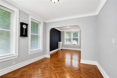 Solid brick 2 family corner home. First floor features formal - photo 8