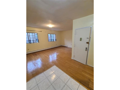 Welcome to this Move-In Ready Three Family Home Located in the - photo 2