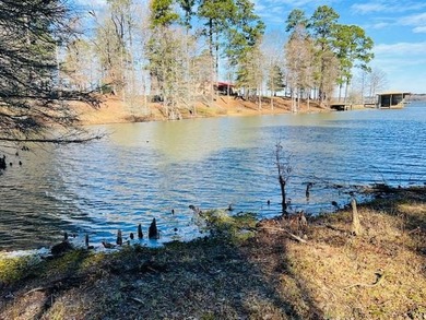 A beautiful, wooded waterfront lot located in the newest - photo 7