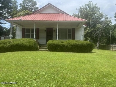 Investment Opportunity! This home features 2 BR, 1 bath, a large - photo 1