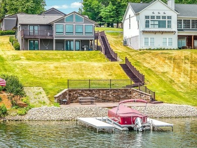 Lake life just got an upgrade. This remodeled waterfront home at - photo 1