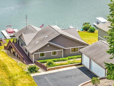 Lake life just got an upgrade. This remodeled waterfront home at - photo 2