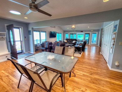 Lake life just got an upgrade. This remodeled waterfront home at - photo 6
