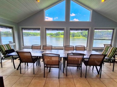 Lake life just got an upgrade. This remodeled waterfront home at - photo 9