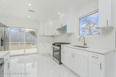 Welcome to 12 Fairview Avenue, a fully gut-renovated corner - photo 9