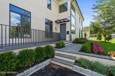 Experience the epitome of luxury living in this stunning new - photo 3