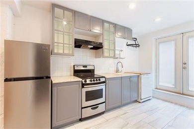 This two-family home in Sunset Park sits on a full 17' * 100' - photo 4