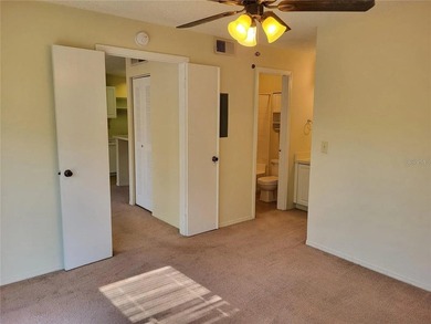 Discover comfortable living in this charming condominium located - photo 8
