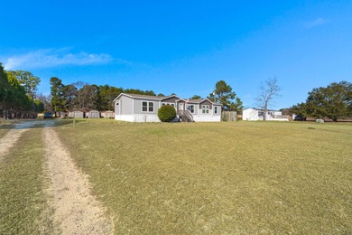 Nestled on a generous 2.4-acre lot in Orangeburg County, 328 - photo 3