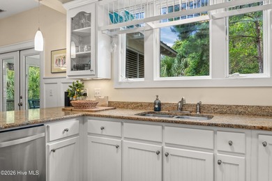Discover this charming, well-kept secret nestled right in the - photo 14