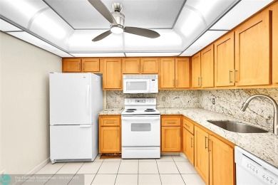 Lake Condo For Sale in Coconut Creek, Florida