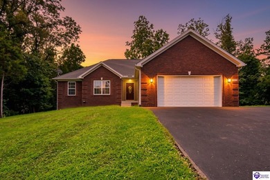 Welcome home to this beautiful ranch nestled in the highly - photo 1
