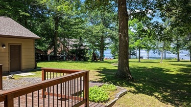 Escape to this charming four-season cabin on highly sought-after - photo 5