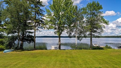 Escape to this charming four-season cabin on highly sought-after - photo 9