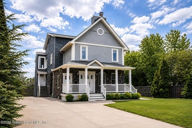 Welcome to 5434 Amboy Road - an exceptional legal two-family - photo 2
