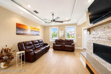 Welcome to 5434 Amboy Road - an exceptional legal two-family - photo 3