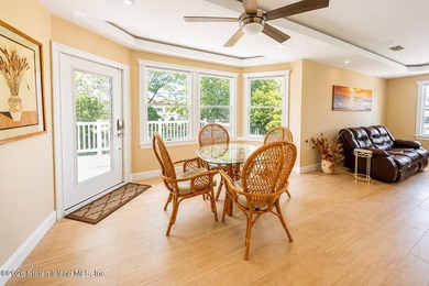 Welcome to 5434 Amboy Road - an exceptional legal two-family - photo 6